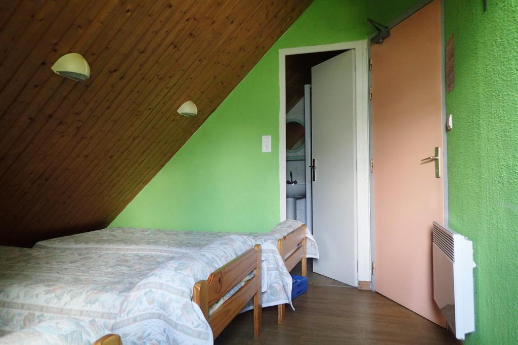 Voodi või voodid majutusasutuse Gîte Soum de l'Ase toas