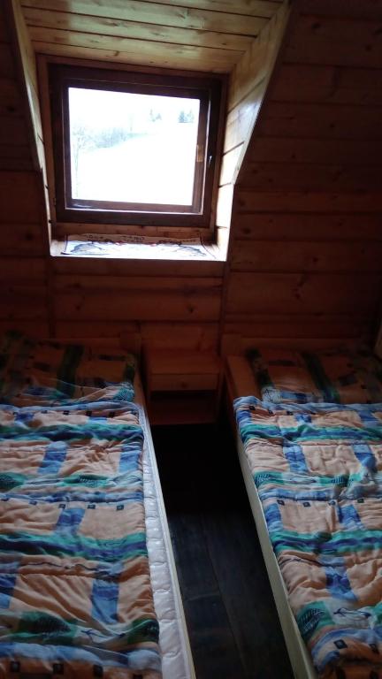 Postel nebo postele na pokoji v ubytování Chata Tereza