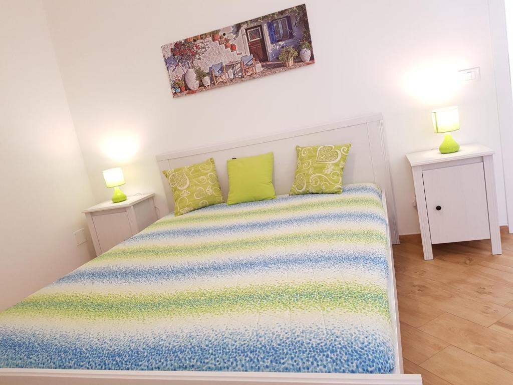 A bed or beds in a room at B&B Verdearancio