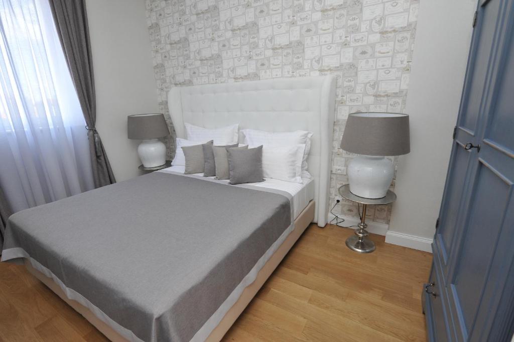 Postel nebo postele na pokoji v ubytování Bajamonti 5 Luxury Rooms