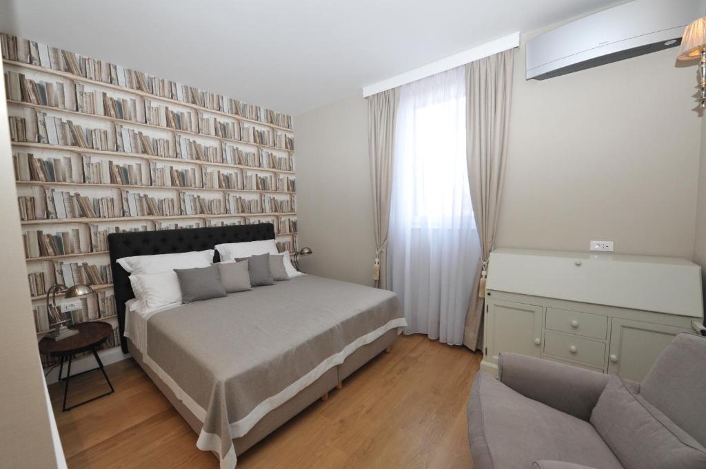 Postel nebo postele na pokoji v ubytování Bajamonti 5 Luxury Rooms
