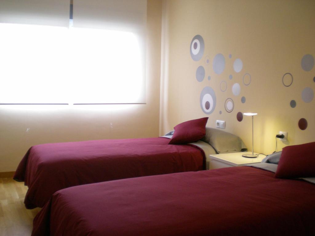 Cama ou camas em um quarto em De la Rosa