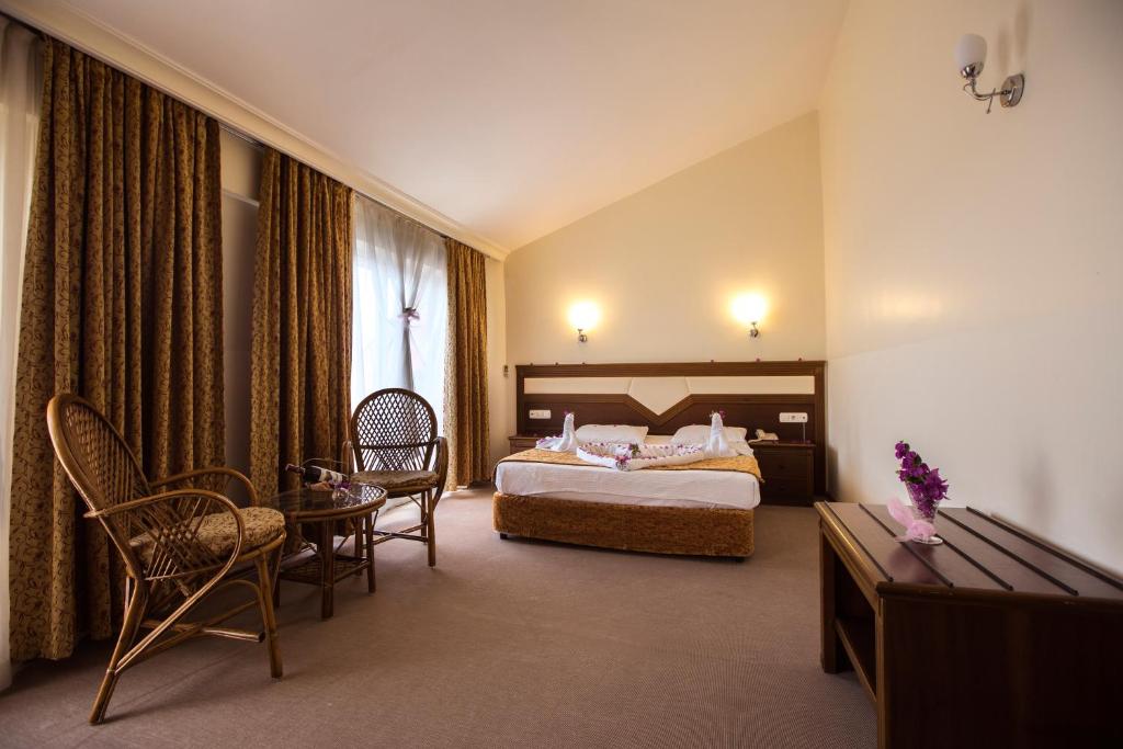 Postel nebo postele na pokoji v ubytování Valeri Beach Hotel