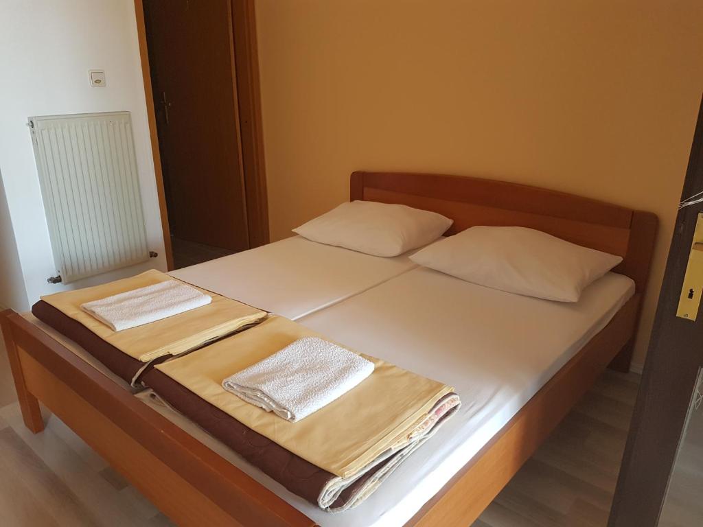 Postel nebo postele na pokoji v ubytování Rooms Hunter