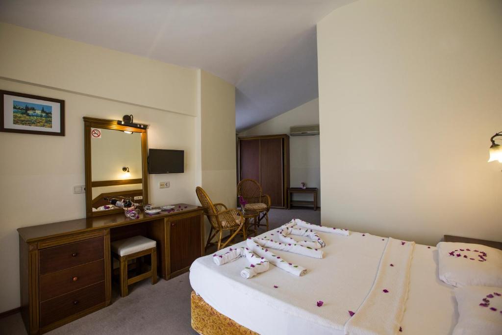 Postel nebo postele na pokoji v ubytování Valeri Beach Hotel