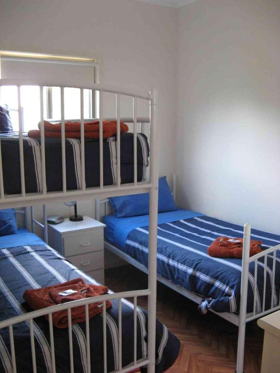 Postel nebo postele na pokoji v ubytování Lookout Holiday Units