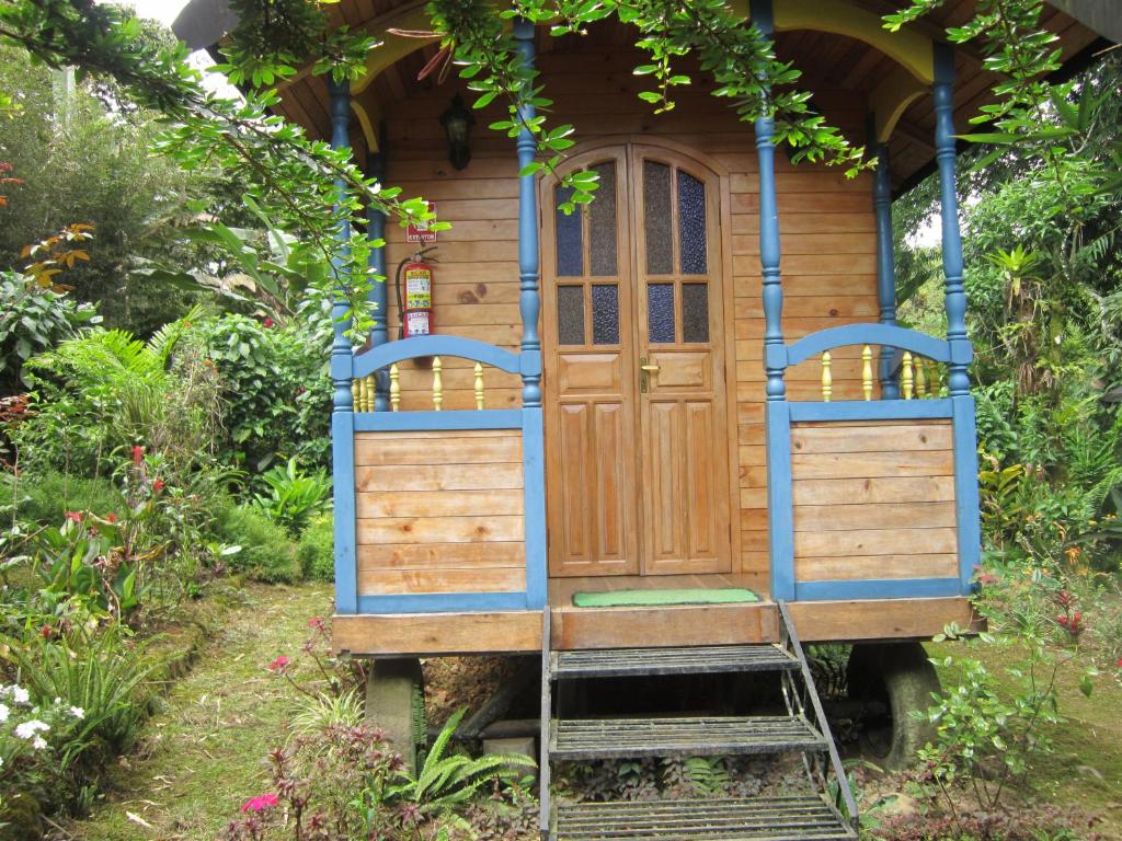 Zahrada ubytování Hosteria La Roulotte - Mindo