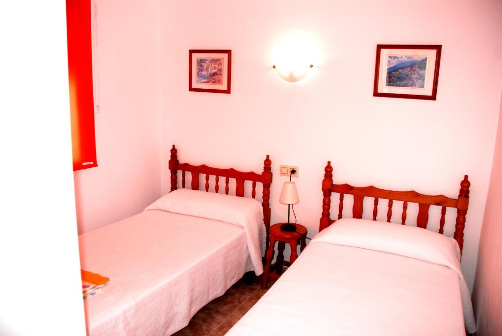 Posteľ alebo postele v izbe v ubytovaní Apartamentos Inter Gandia Playa