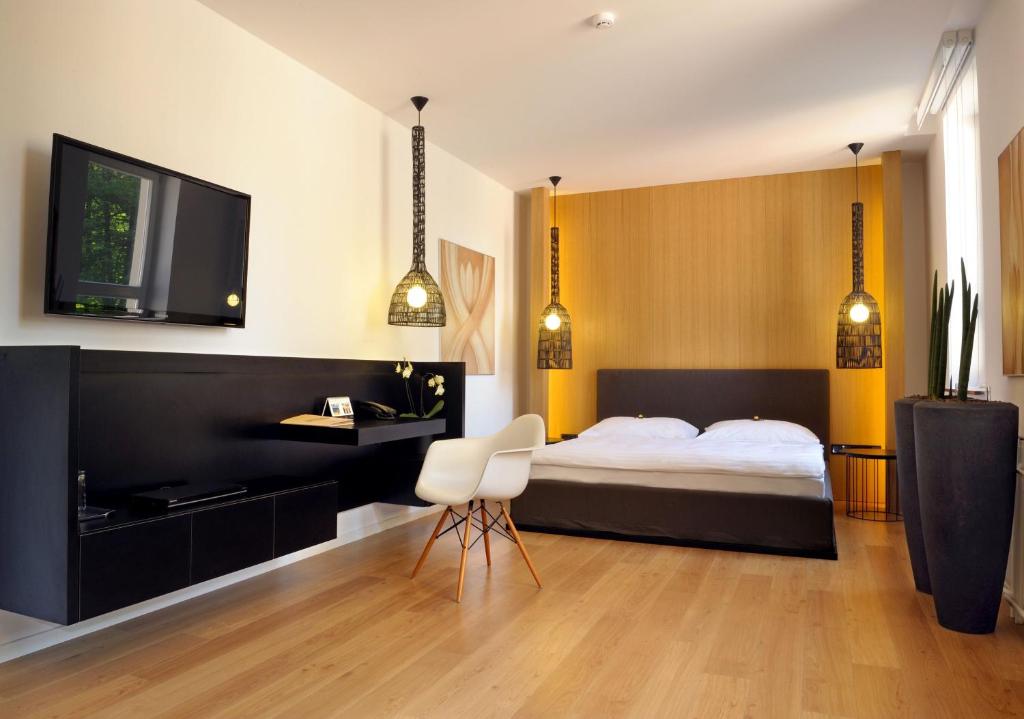 Voodi või voodid majutusasutuse Hotel Tomášov toas
