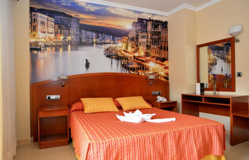 Postel nebo postele na pokoji v ubytování Hotel Portonovo
