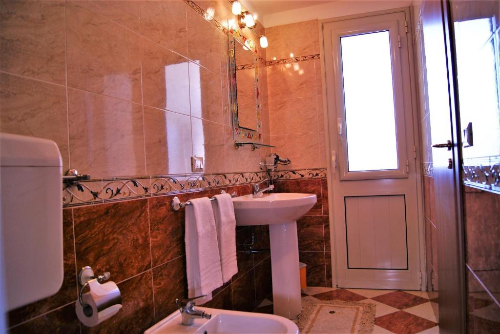 Kúpeľňa v ubytovaní Oleaster - Rooms & Apartments