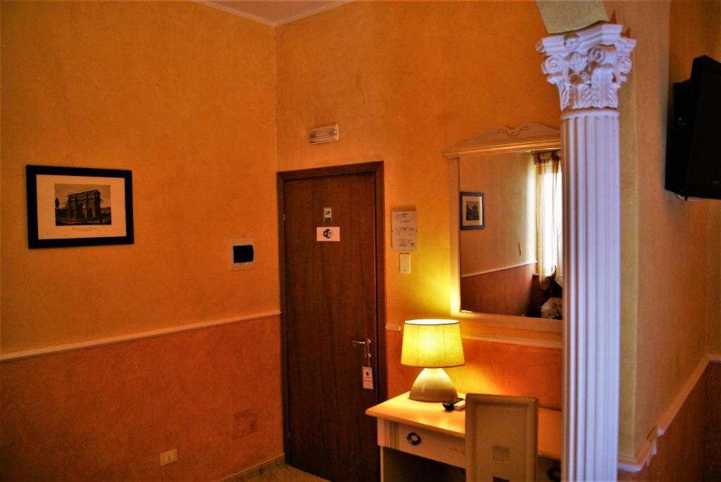 Televízia a/alebo spoločenská miestnosť v ubytovaní Oleaster - Rooms & Apartments