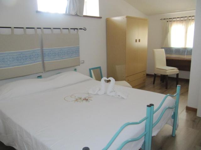 Postel nebo postele na pokoji v ubytování B&B I Limoni