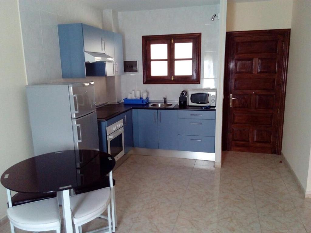 A kitchen or kitchenette at Sweet Home San Blas