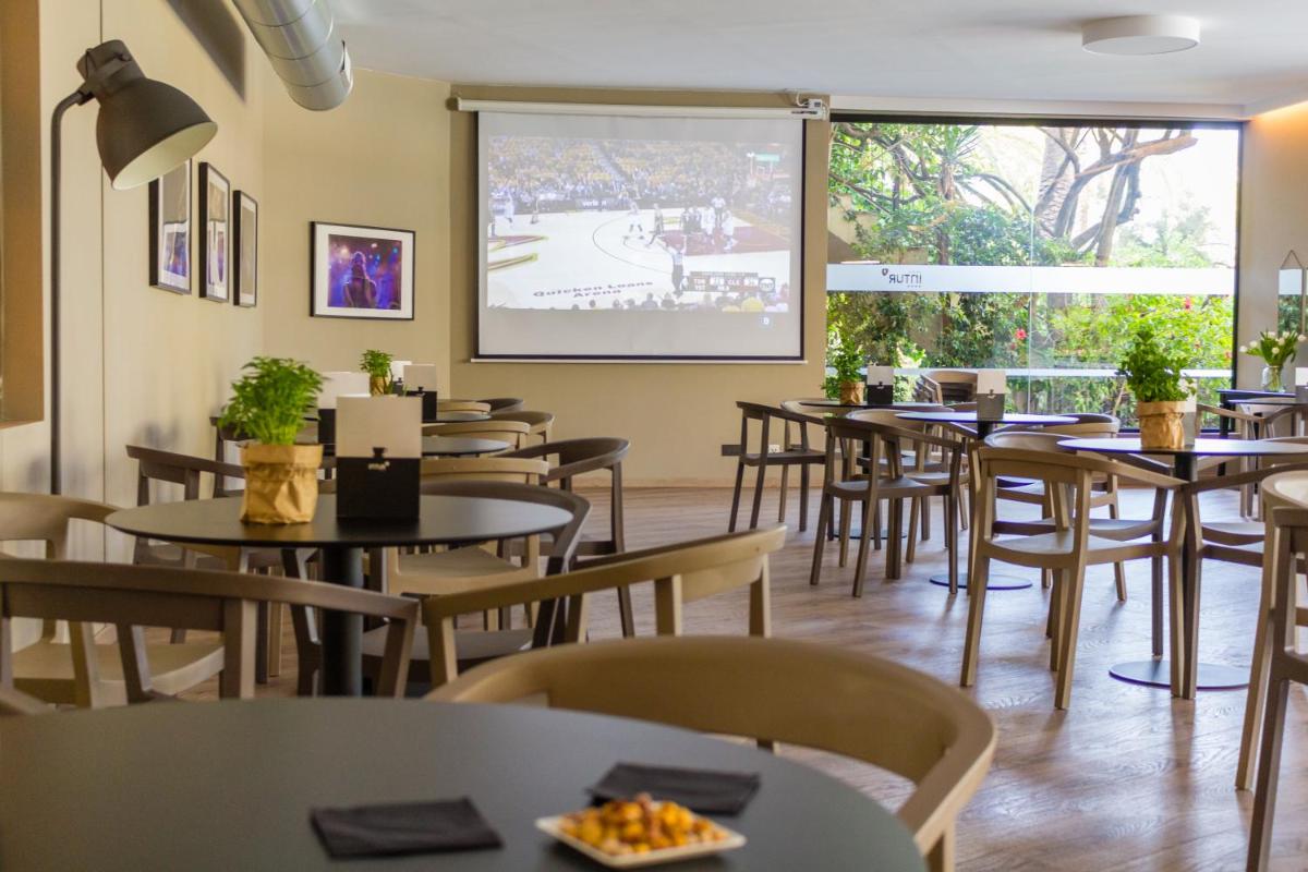 Un restaurante o sitio para comer en Intelier Orange