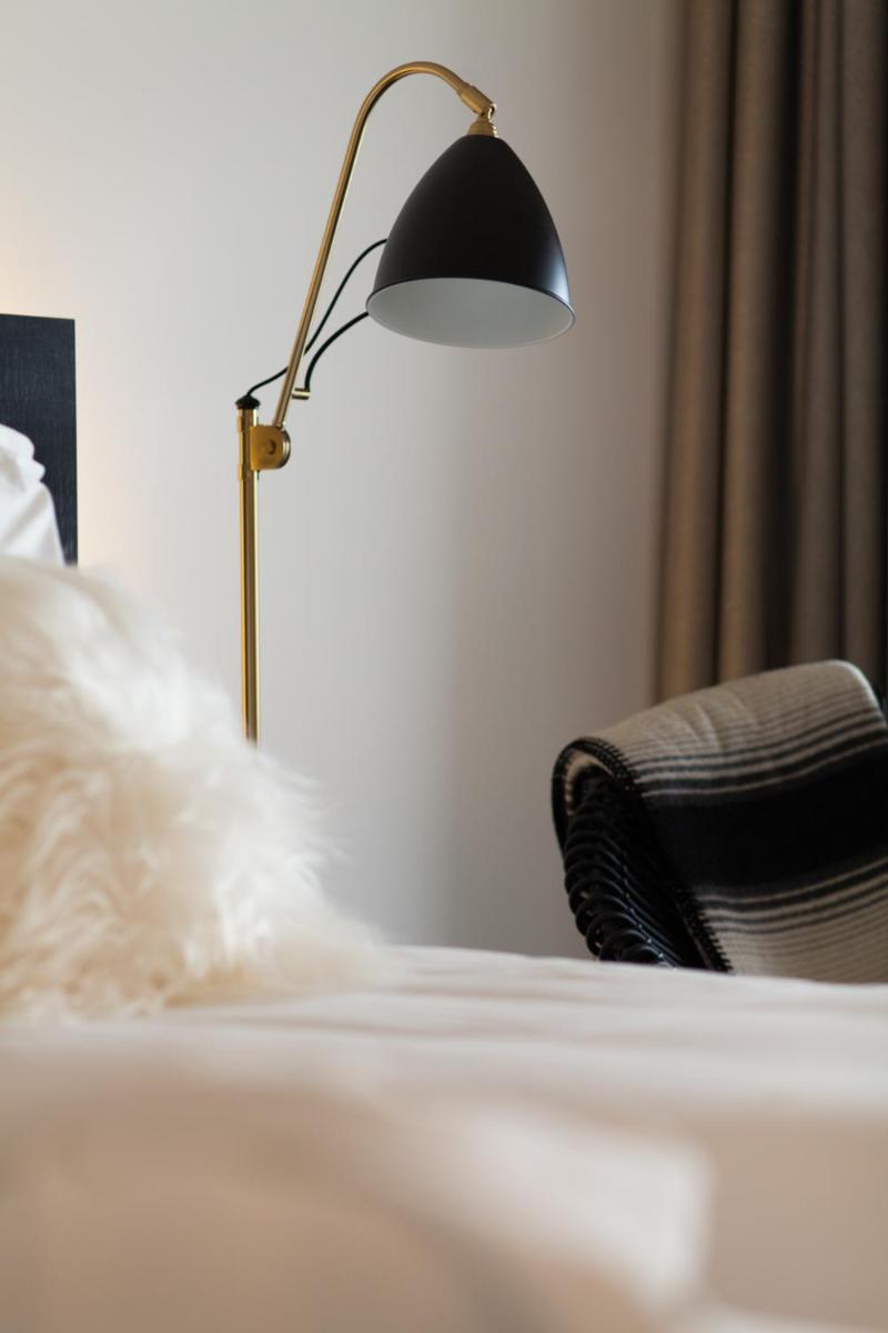 Un ou plusieurs lits dans un hébergement de l'établissement Hôtel & Spa Villa Seren