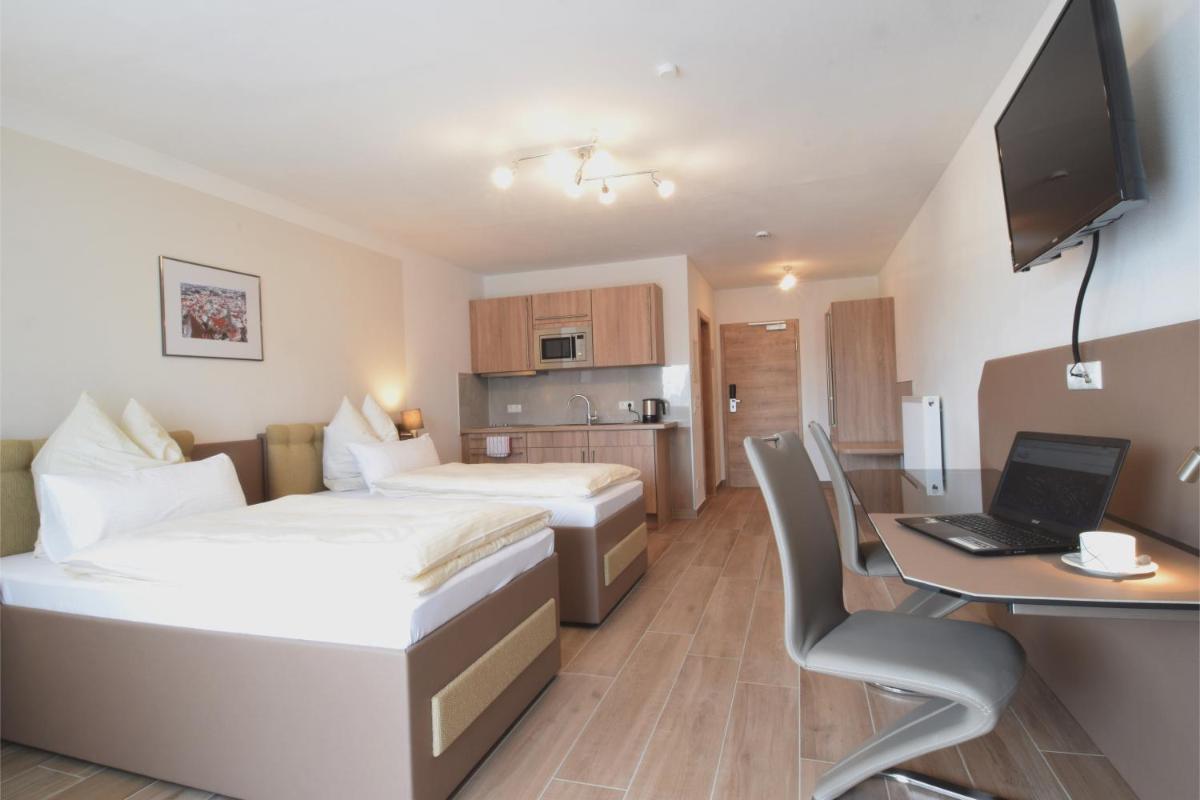 Aparthotel Donaustern - Housity