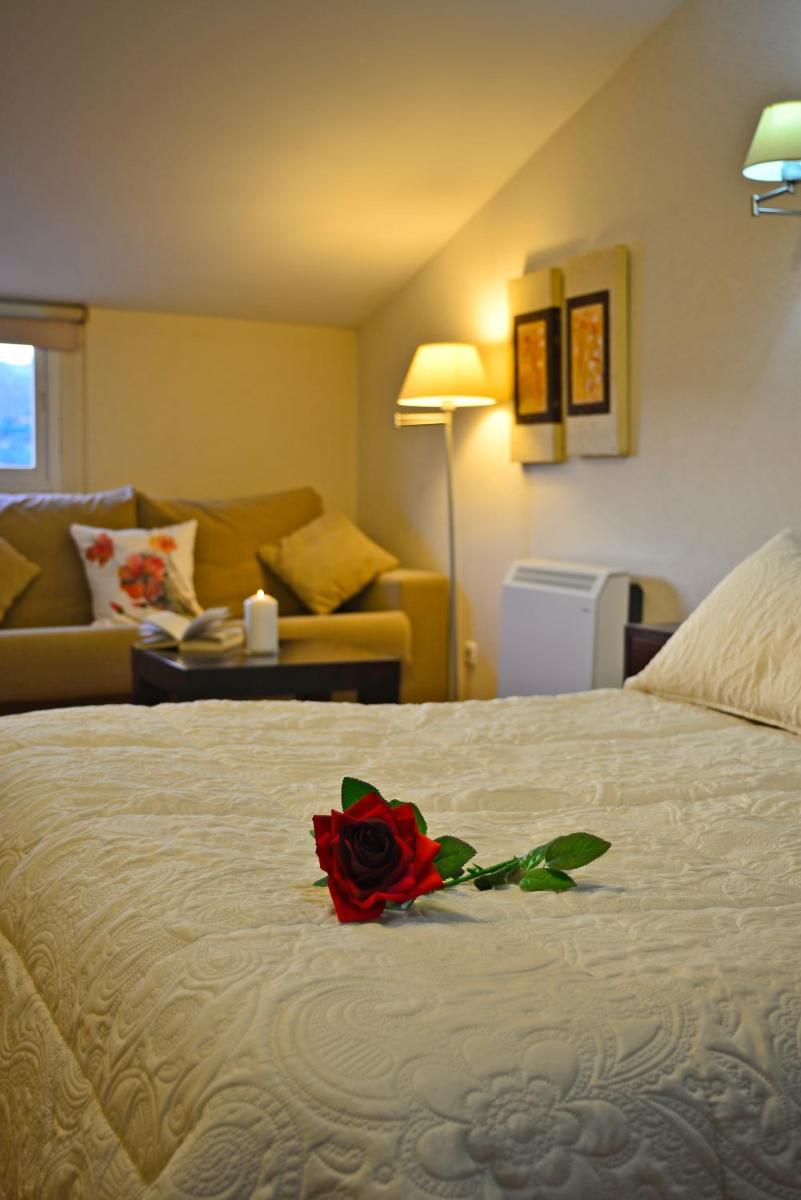 Cama o camas de una habitación en Hotel & Spa PLAZA Arriate