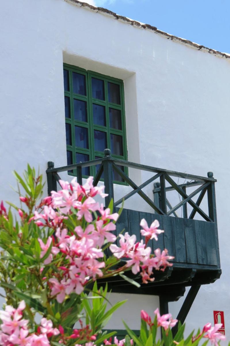 Un balcón o terraza de Casas Heddy, Well-being Resort