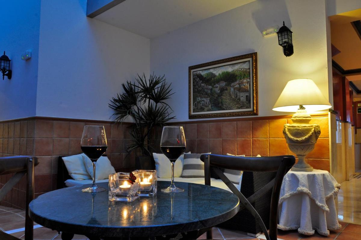 Zona de estar de Hotel & Spa PLAZA Arriate