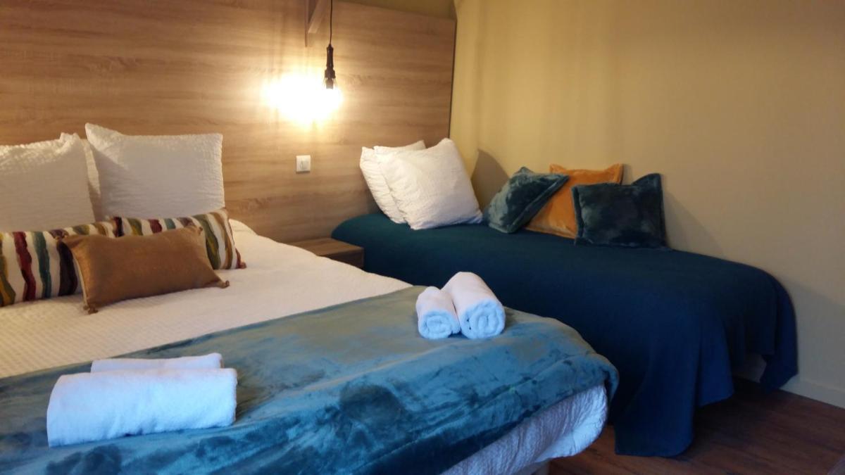 Un ou plusieurs lits dans un hébergement de l'établissement Hotel Mendionde