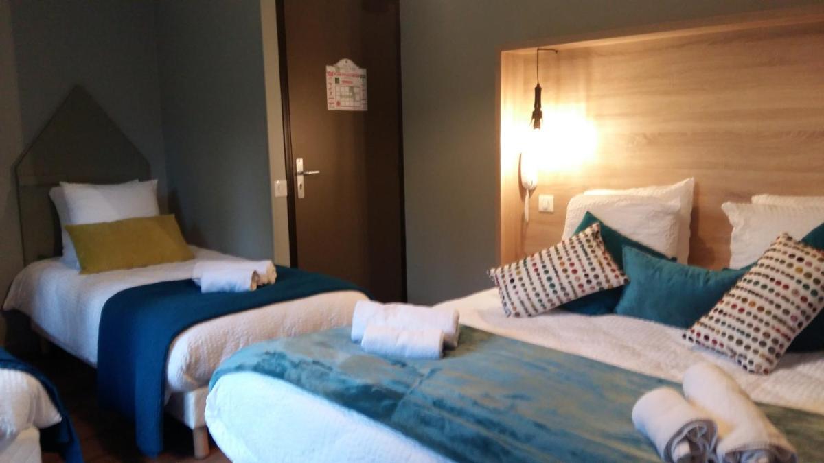 Un ou plusieurs lits dans un hébergement de l'établissement Hotel Mendionde