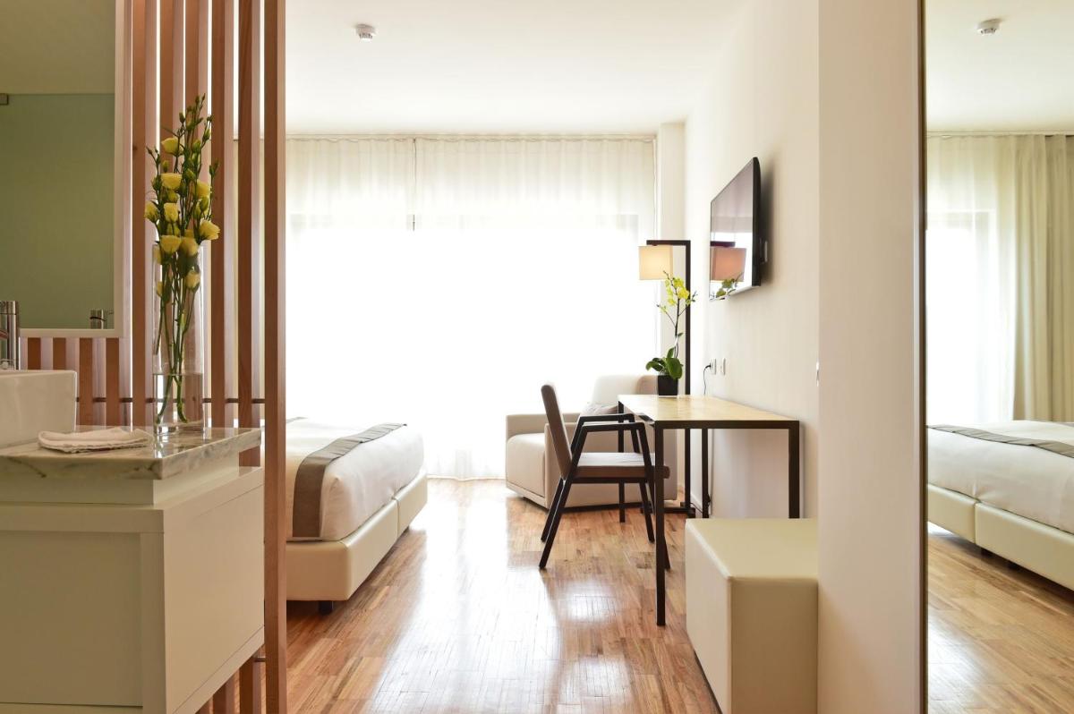Uma cama ou camas num quarto em Algarve Race Resort - Hotel
