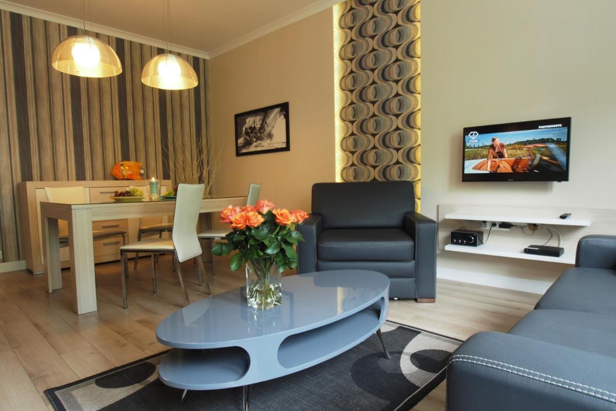Grand-Tourist Center Point Apartments - Housity