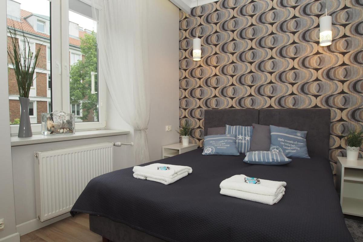 Grand-Tourist Center Point Apartments - Housity