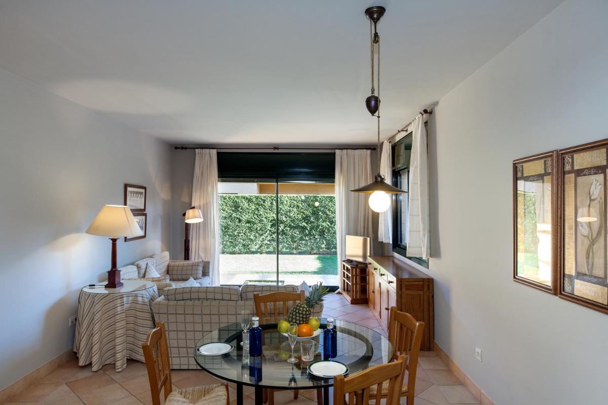 Zona de estar de Apartahotel Suites Vila Birdie