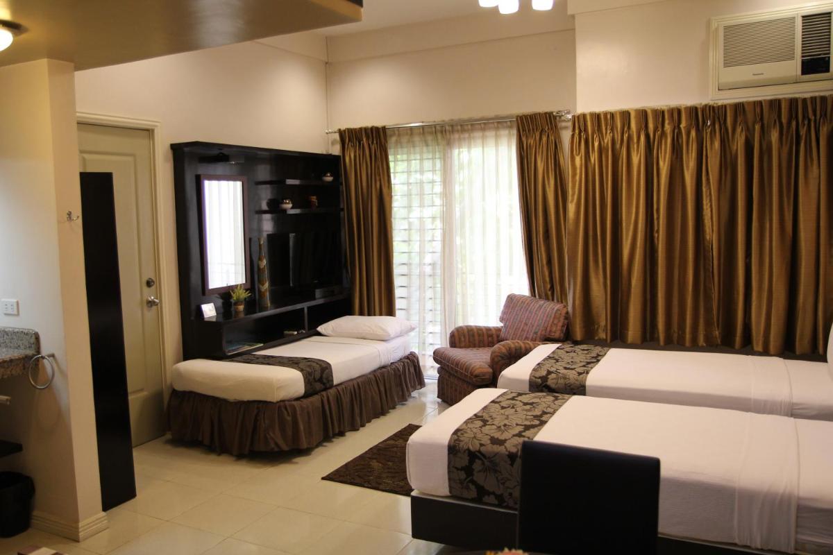 New Manila Suites - Housity