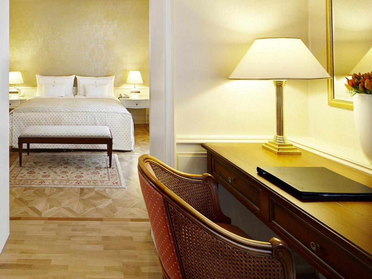 Ein Bett oder Betten in einem Zimmer der Unterkunft Colombi Hotel