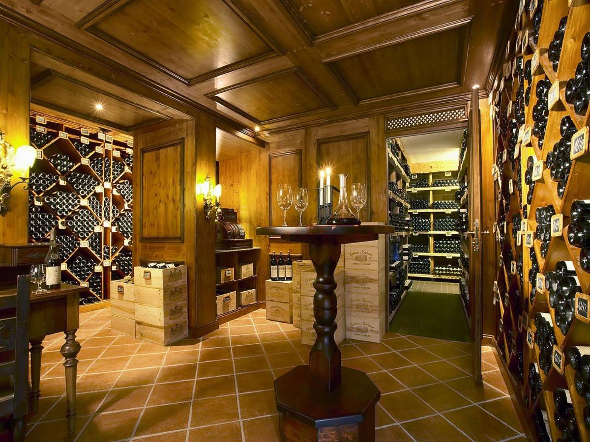 Ein Sitzbereich in der Unterkunft Colombi Hotel