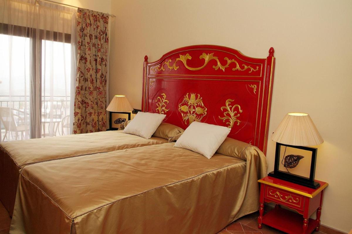 Cama o camas de una habitación en Hotel & Spa Sierra de Cazorla 4*