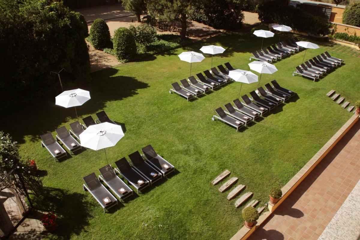 Jardín al aire libre en Luna Club Hotel Yoga & Spa 4Sup