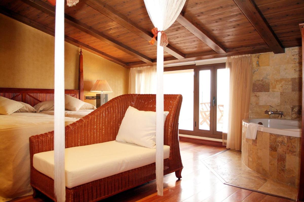 Cama o camas de una habitación en Hotel & Spa Sierra de Cazorla 4*