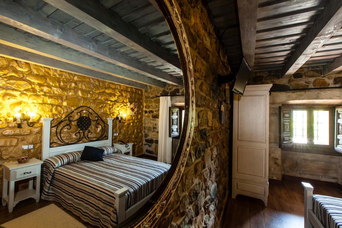 Cama o camas de una habitación en Hotel Spa Casona La Hondonada