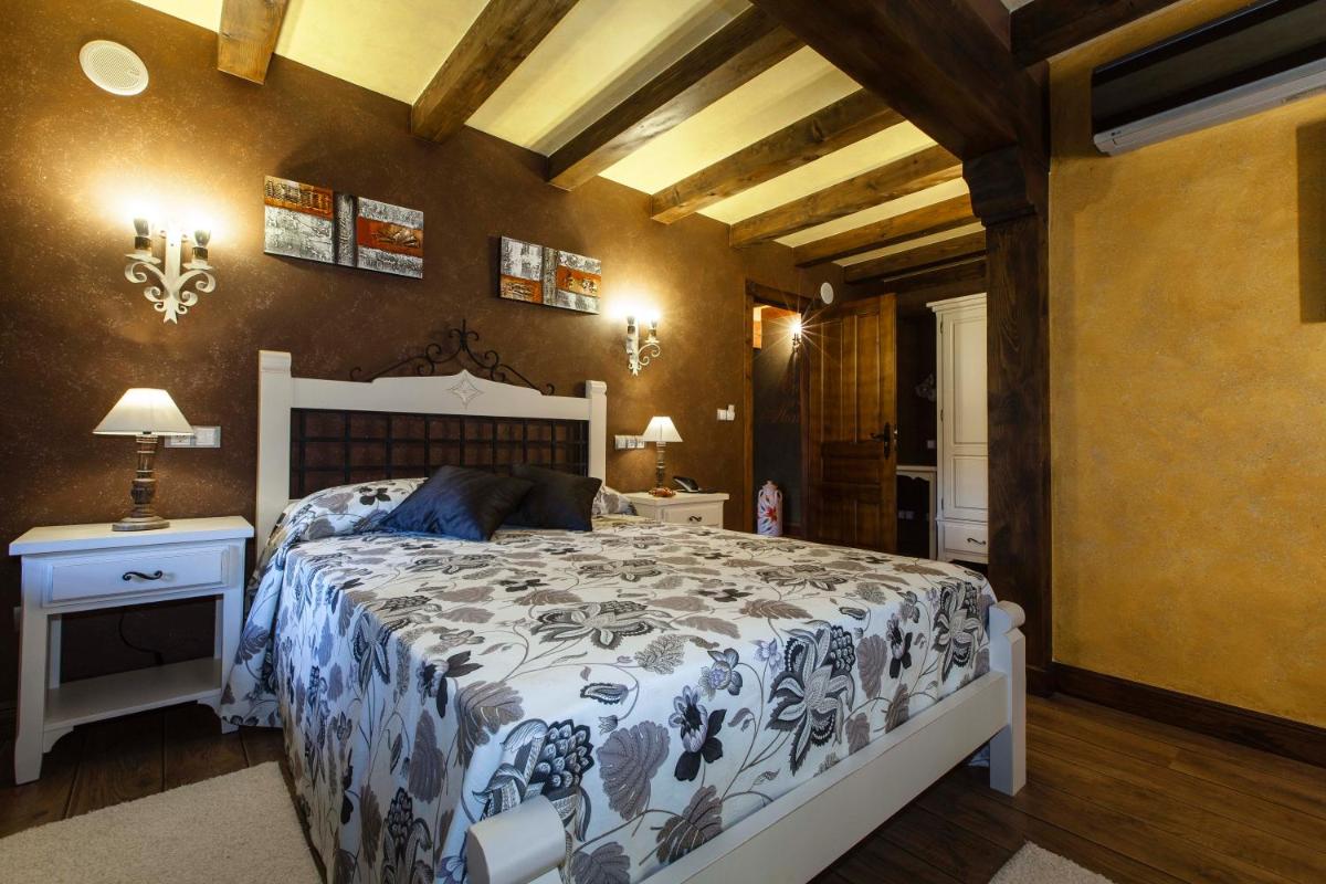 Cama o camas de una habitación en Hotel Spa Casona La Hondonada
