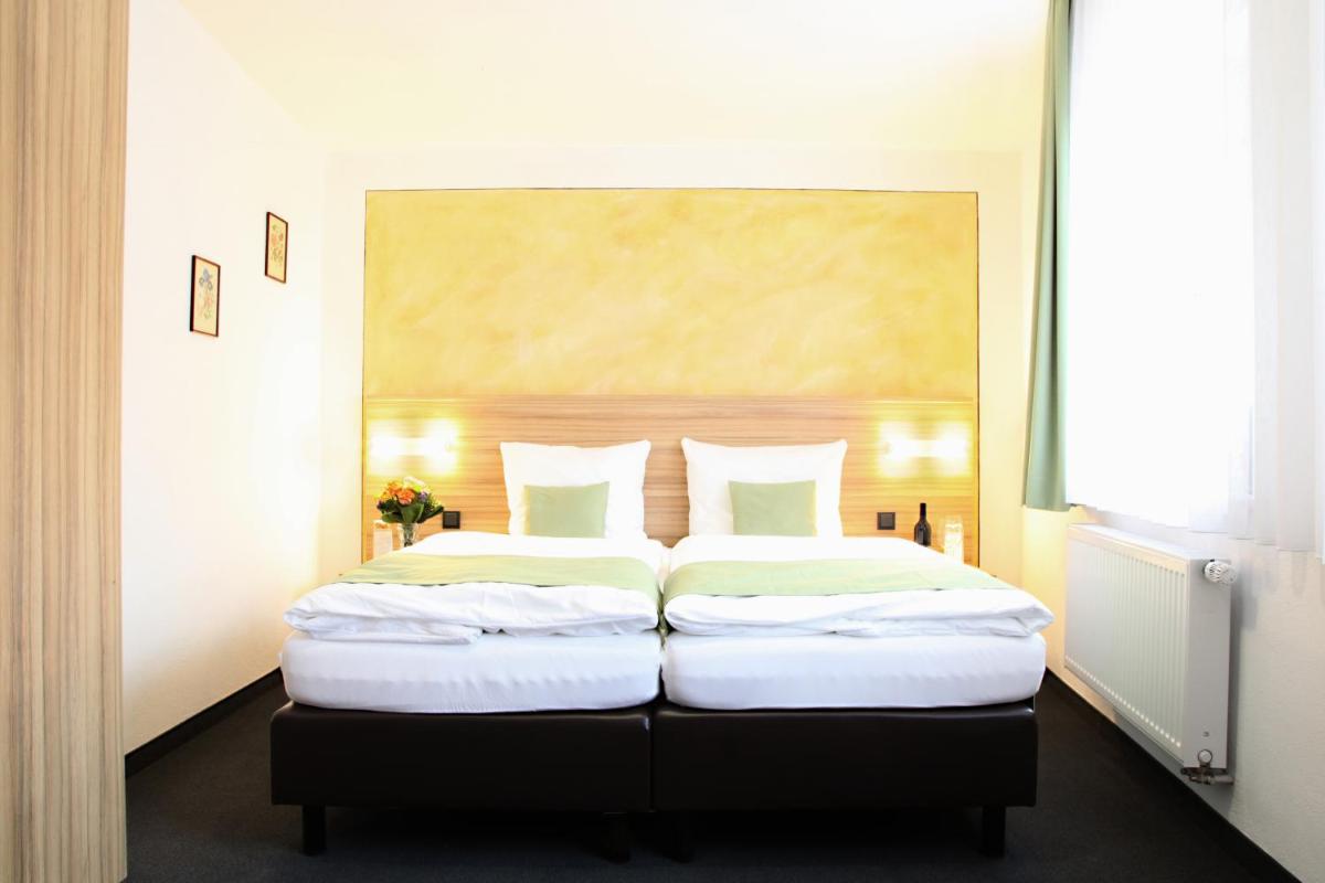 Hotel Garni Goldene Traube - Housity