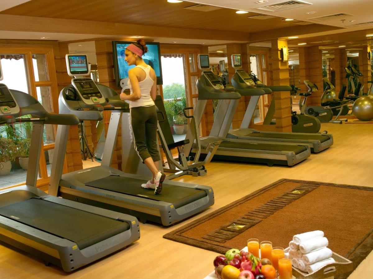 a woman standing on a treadmill in a gym at Jaypee Vasant Continental in New Delhi