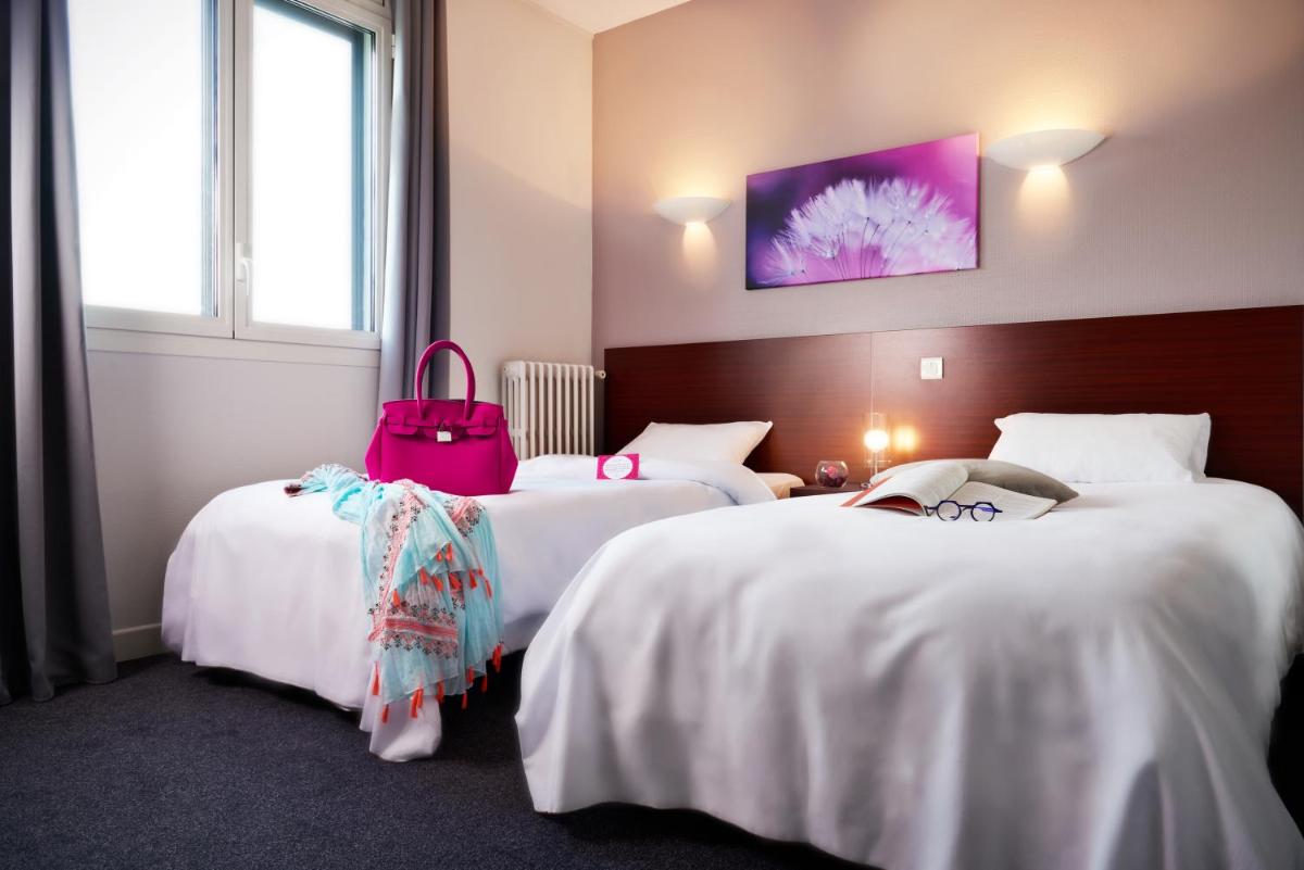 Logis Hotels Grand Hotel d'Orléans et Restaurant Le Goulu - Housity