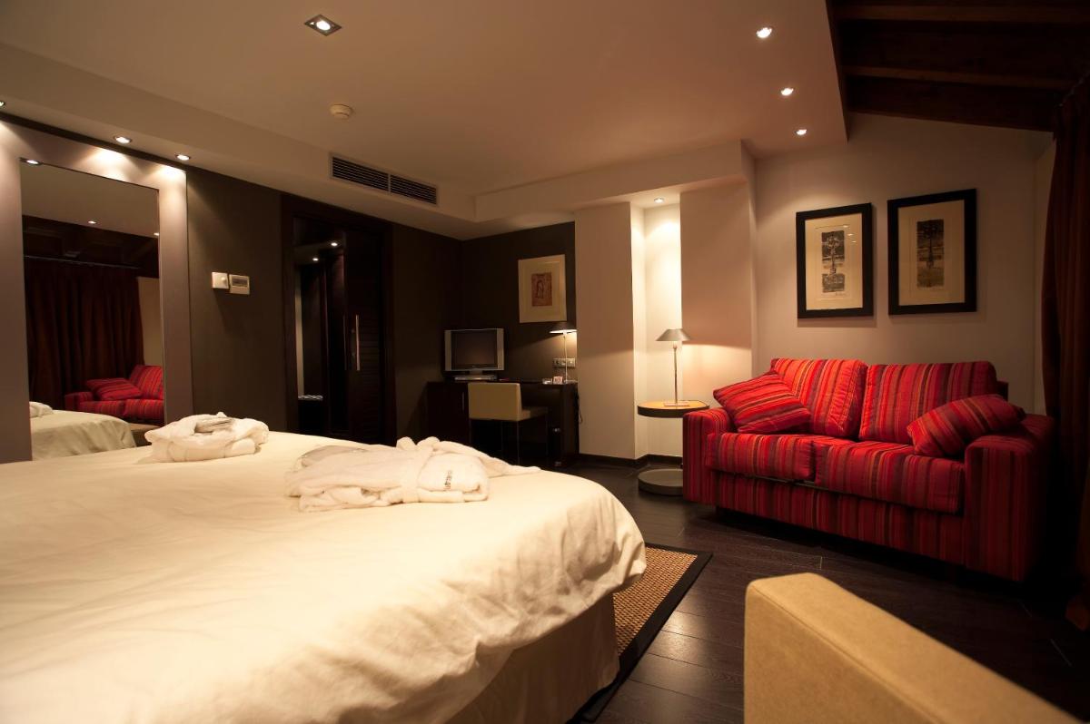 Cama o camas de una habitación en Hotel La Trufa Negra