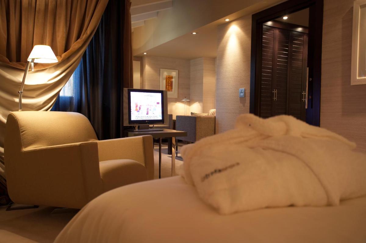 Cama o camas de una habitación en Hotel La Trufa Negra