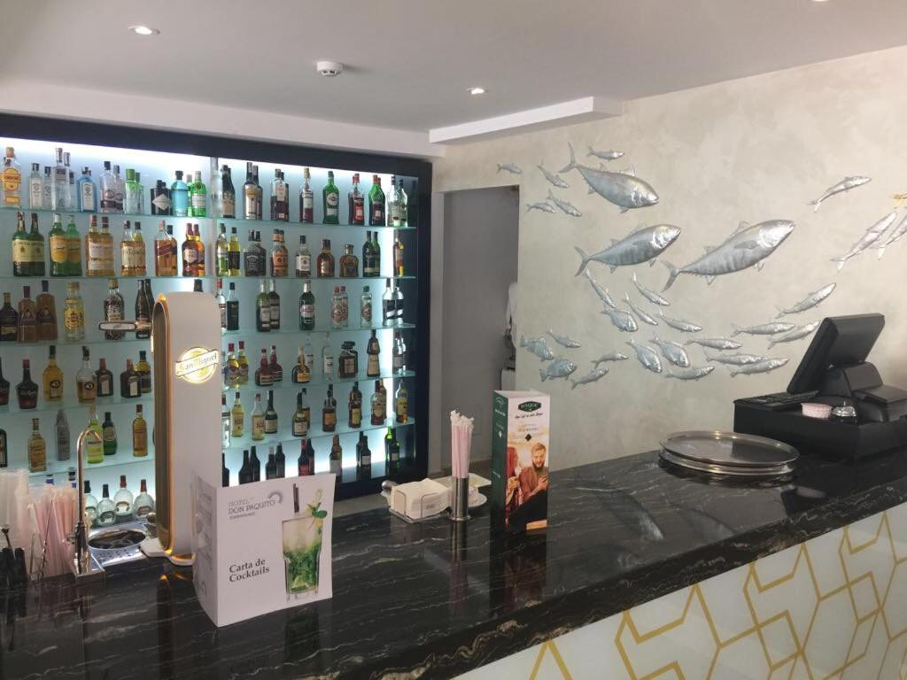 El salón o zona de bar de Essence Hotel Boutique