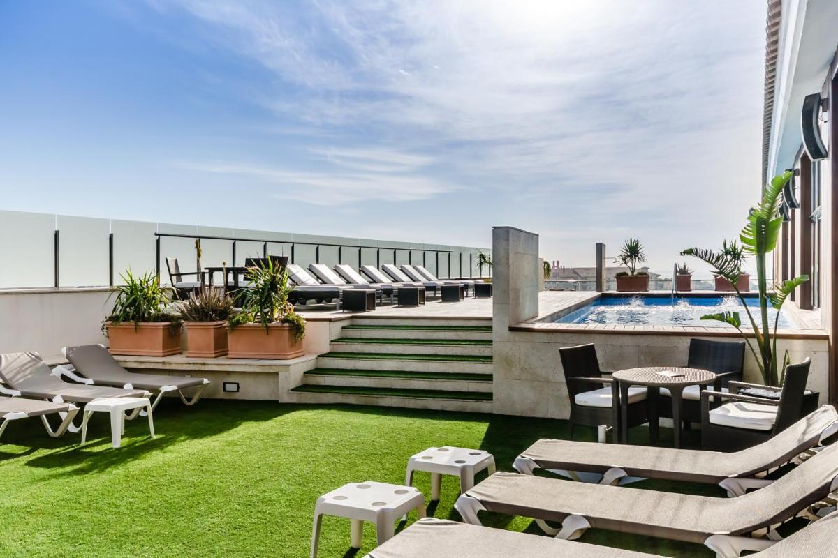 Un balcón o terraza de Hotel 525