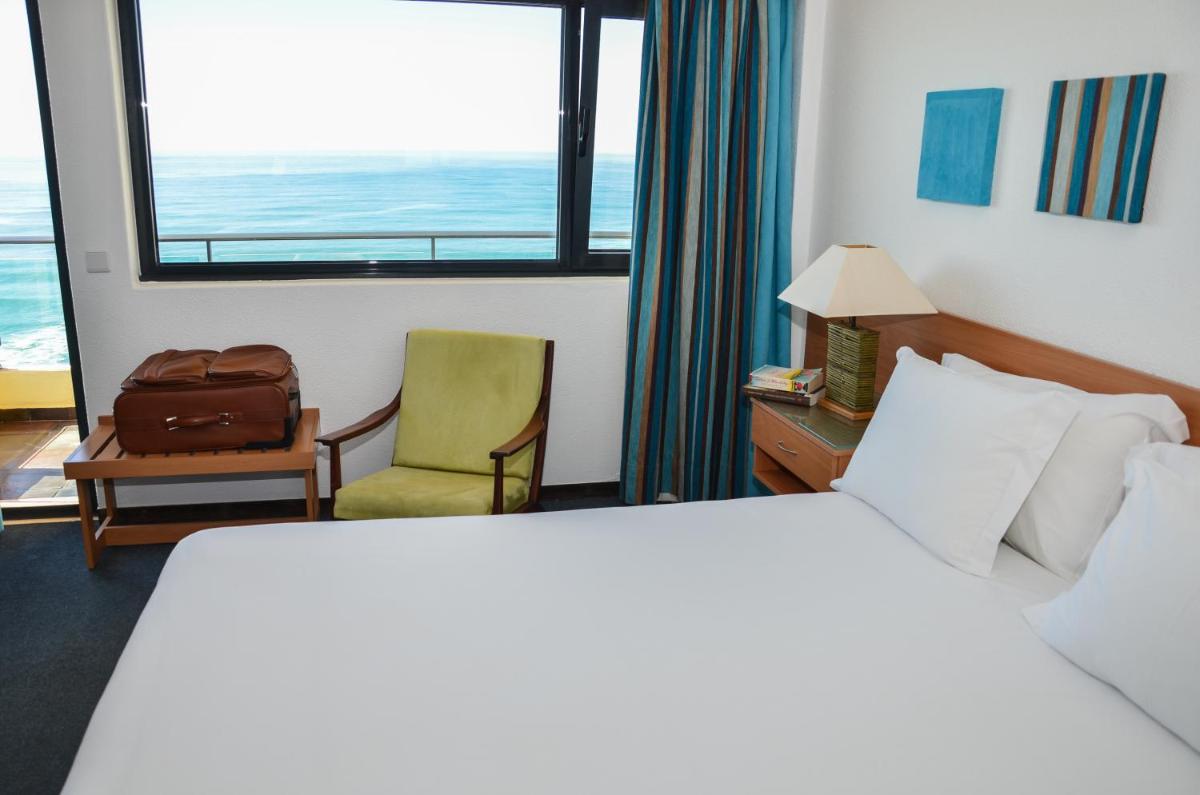 Uma cama ou camas num quarto em Hotel Golf Mar
