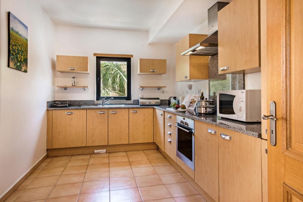 A cozinha ou kitchenette de Estrela da Luz Resort