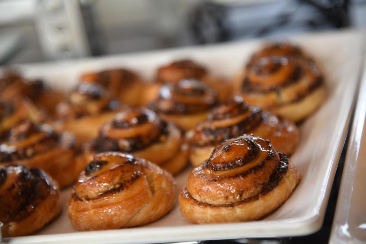 a tray of pastries on a table at Taj City Centre Gurugram in Gurgaon