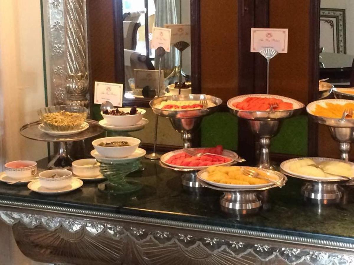 a buffet of different types of food on a table at The Raj Palace (Small Luxury Hotels of the World) in Jaipur