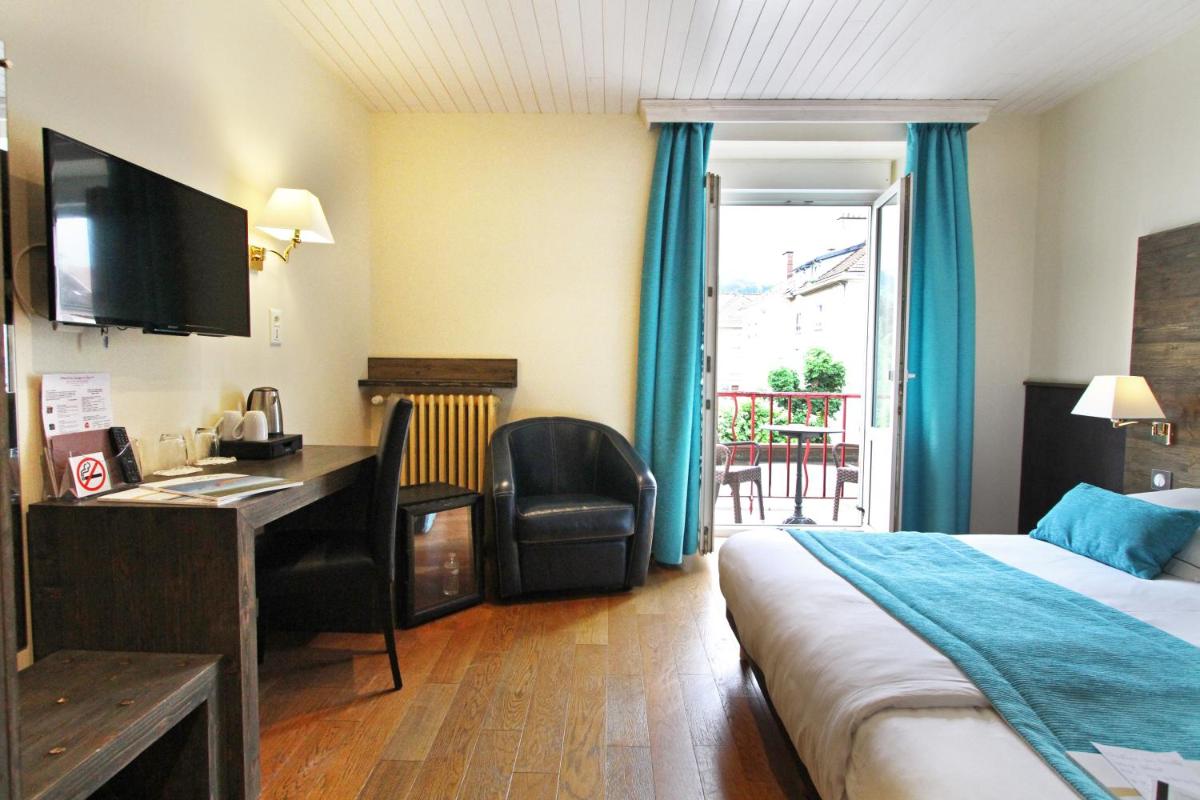 Un ou plusieurs lits dans un hébergement de l'établissement Hotel de la Jamagne & Spa